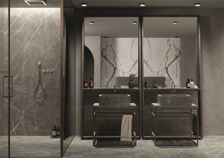 Bagno moderno e minimal nella tonalità grintosa del gres Marble Gray matte in cui sono realizzati il pavimento, il rivestimento della doccia e anche i lavabi su misura assemblati