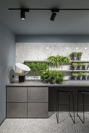 Modern kitchen in CEMENT DARK GRAY that combines minimal and industrial style