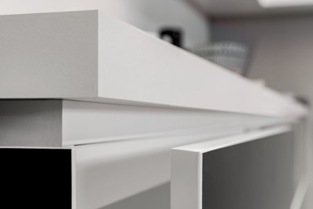 Kitchen detail made with Color White stoneware top and drawers covered in Color Black, both ceramic from the Florim Stone line