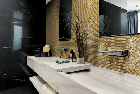 Integrated wall-hung washbasin with concealed drain in Marble Calacatta Gold A