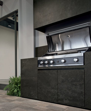 Modern bespoke kitchen covered in Metal Burnished stoneware with matte finish